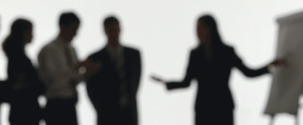 shadow silhouettes of people in business attire talking